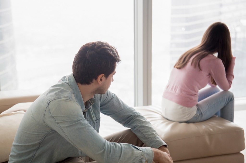 couple breaking up living together